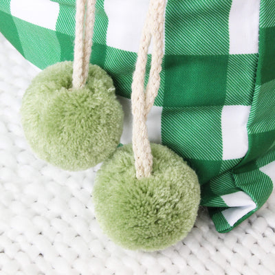 green santa sack with pompoms