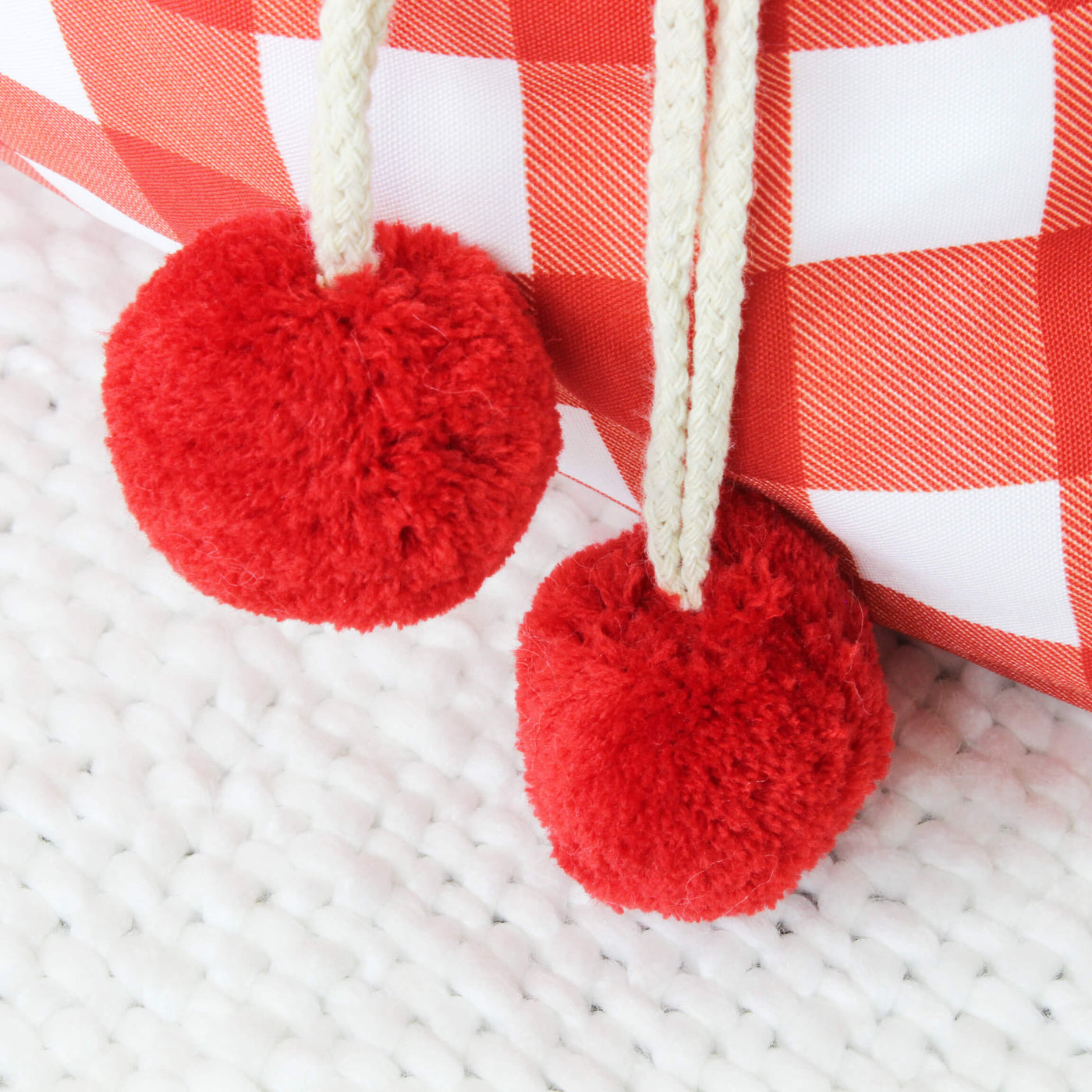 red santa sack with pompoms